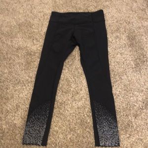 Lululemon tight stuff 7/8 scallop hem leggings